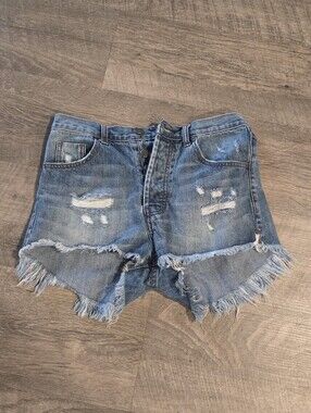 One Teaspoon Outlaws Distressed Denim Shorts.